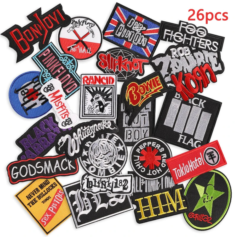 Collection of 26 music band patches on a white background