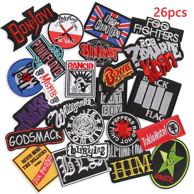 Collection of 26 music band patches on a white background