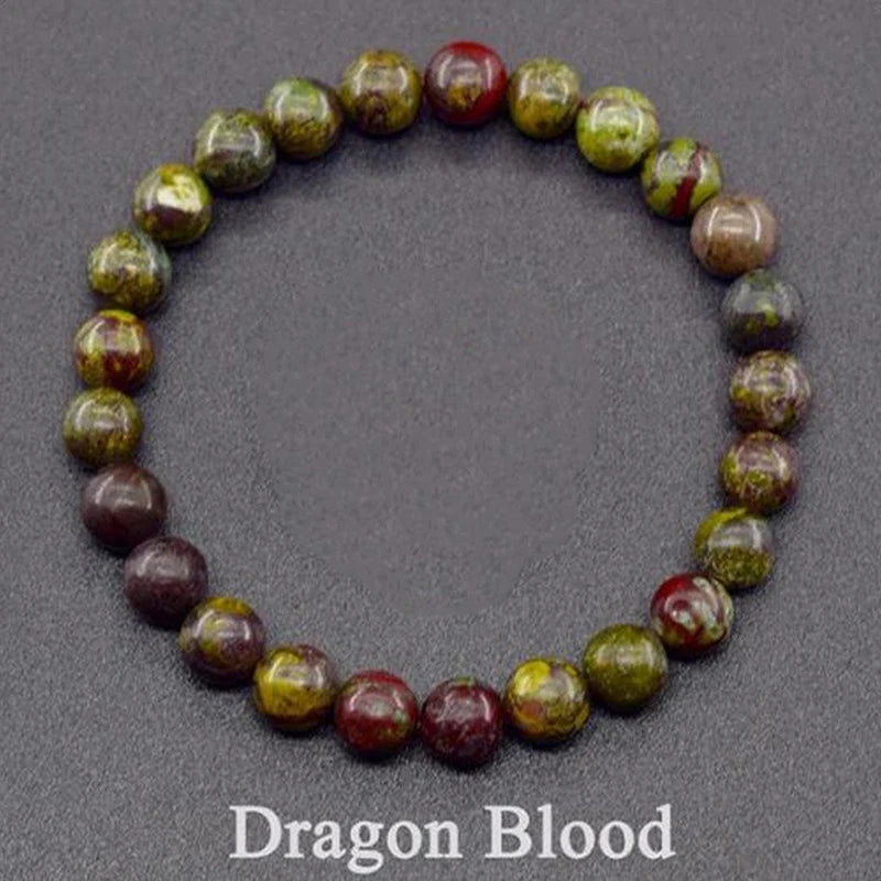 Dragon Blood stone bracelet on a dark background
