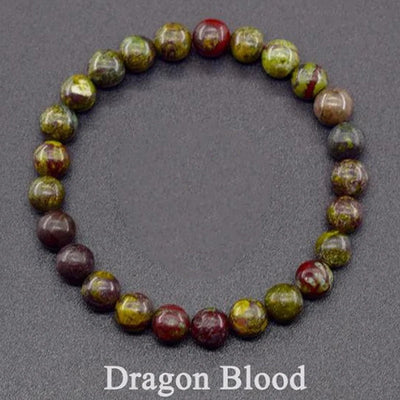 Dragon Blood stone bracelet on a dark background