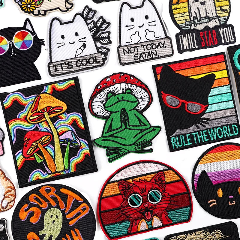 Collection of colorful patches with various designs on a white background