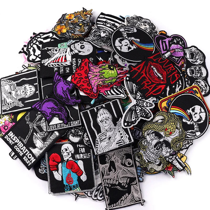Collection of various stickers with different designs on a white background, featuring the brand &