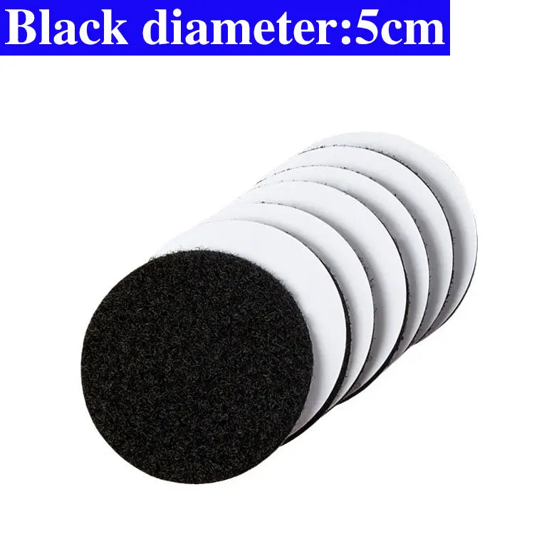 Set of black and white round Velcro pads with a diameter of 5cm on a white background.