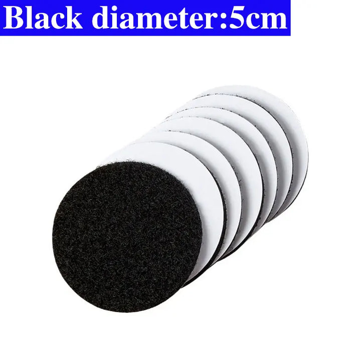 Set of black and white round Velcro pads with a diameter of 5cm on a white background.