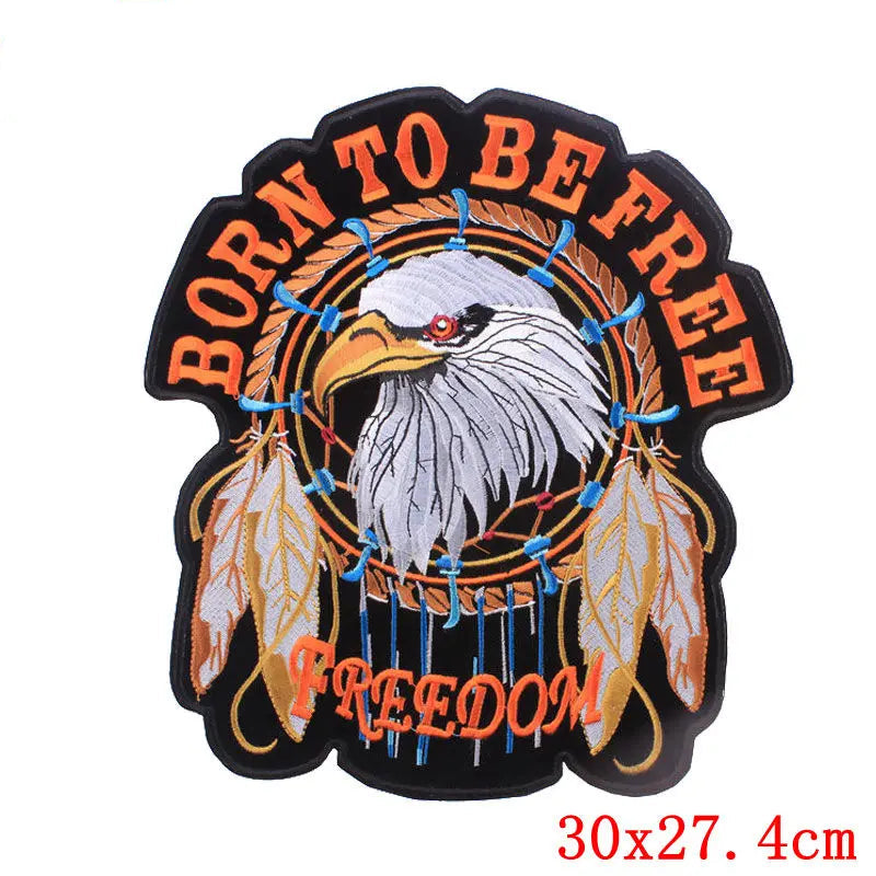 Eagle patch with 'Born to be Free' text and dreamcatcher design on a white background.