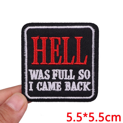 Embroidered patch with 'HELL WAS FULL SO I CAME BACK' text held by a hand, with size '5.5*5.5cm' displayed.