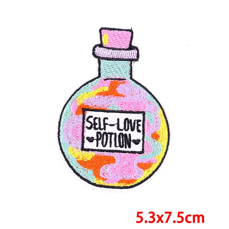 Colorful potion bottle patch with 'Self-Love Potion' text on a white background