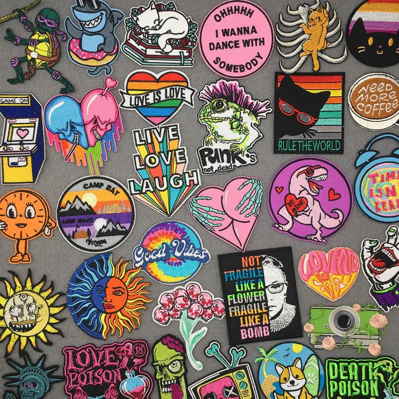 Collection of colorful stickers with various designs on a gray background