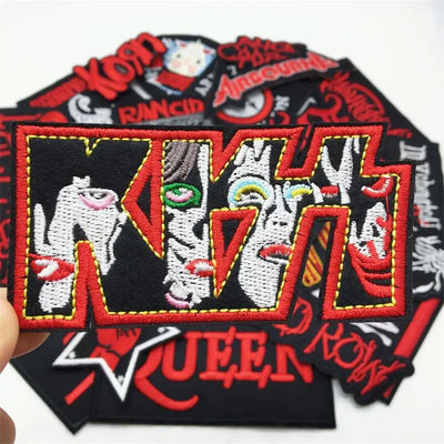 Embroidered patch with band logo and text on a white background