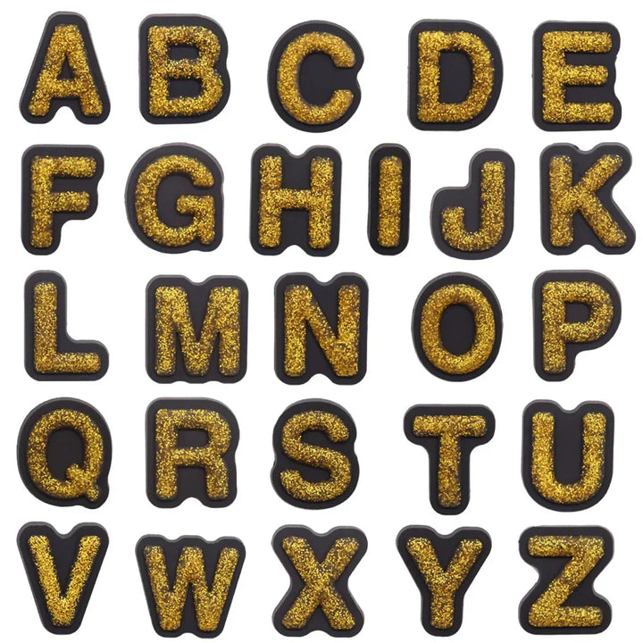 shoe charms Gold glittery letters A to Z on a white background