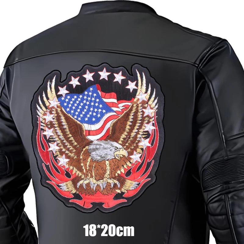 Black leather jacket with an eagle and American flag design on the back, size 18x20cm.