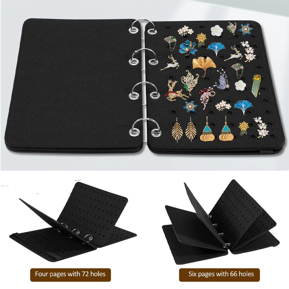Black jewelry display folder with various brooches in four or six pages on a white background 