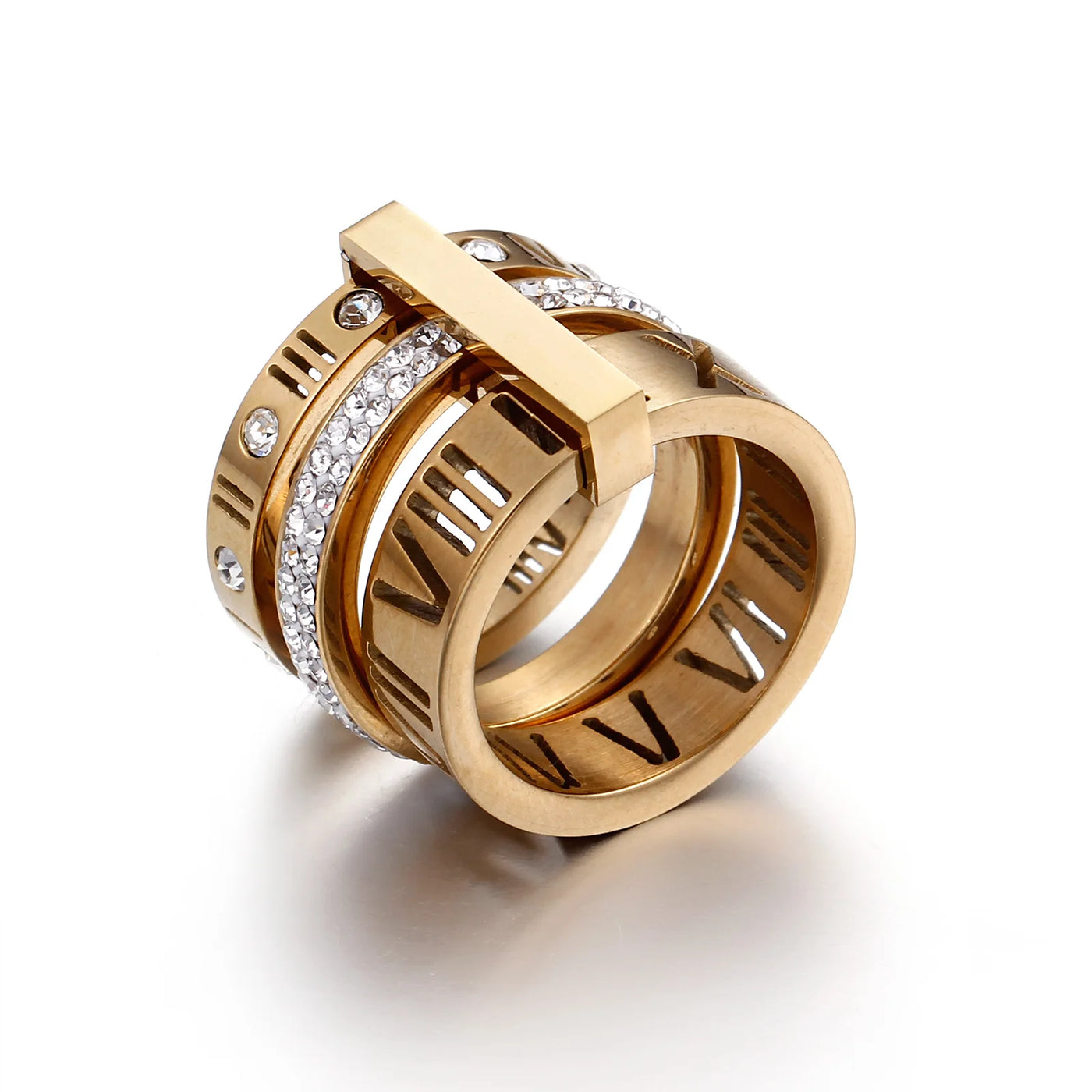 Gold ring with diamond accents on a white background