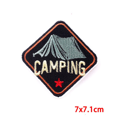 Embroidered patch with a tent design and 'Camping' text on a black border.