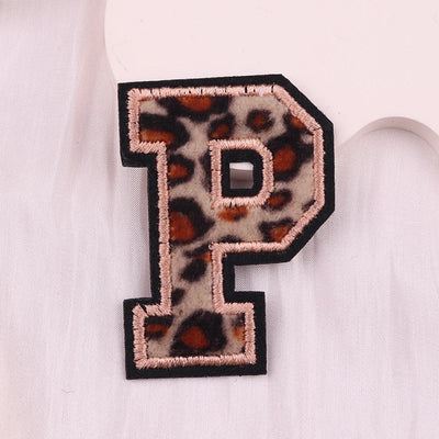Leopard print letter 'P' patch on a white background