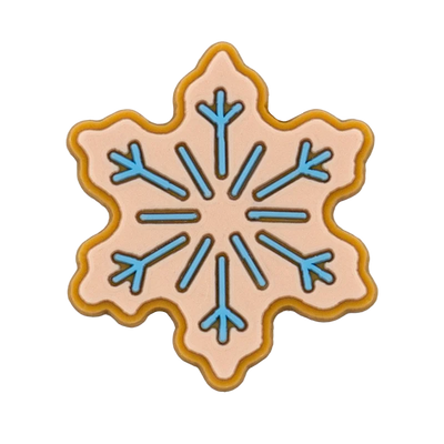 Shoe charm ornament of Decorative cookie shaped like a snowflake with blue and pink design on a white background