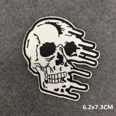 Skull hand patch on a gray background with size 6.2x7.3CM.
