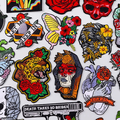 Collection of various colorful patches with different designs on a white background