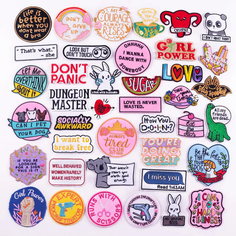 Collection of colorful stickers with various designs and text on a white background