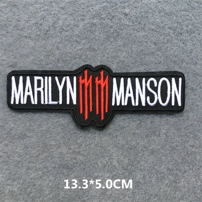 Marilyn Manson logo patch on a gray background with dimensions.