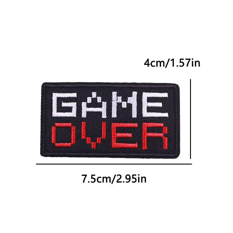 Embroidered patch with 'GAME OVER' text on a white background
