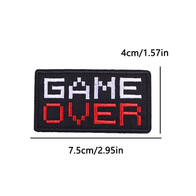 Embroidered patch with 'GAME OVER' text on a white background