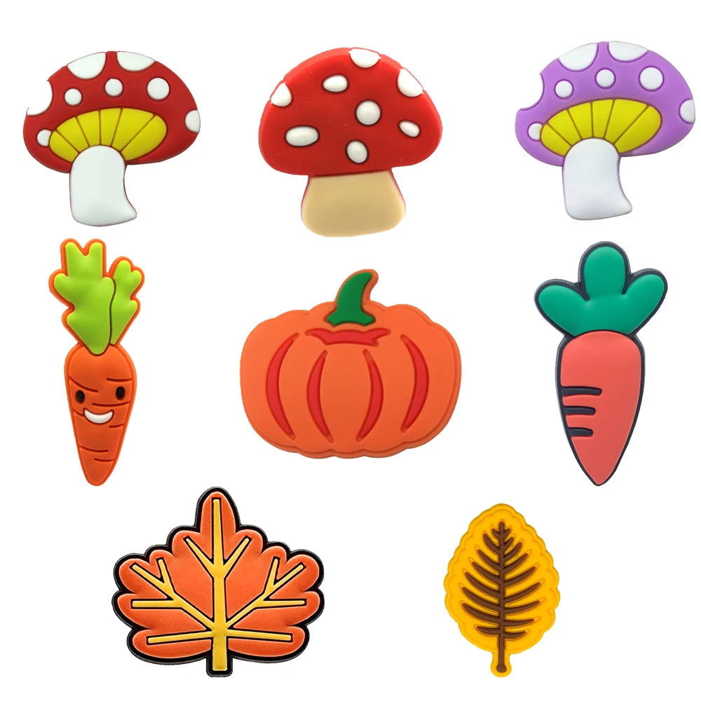 Set of colorful autumn-themed shoe charms including mushrooms, pumpkins, carrots, and leaves on a white background.