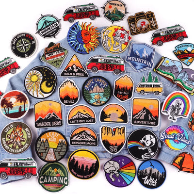 Collection of various camping-themed stickers on a white background