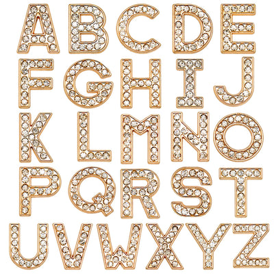 Gold letters shoe charms with rhinestones on a white background