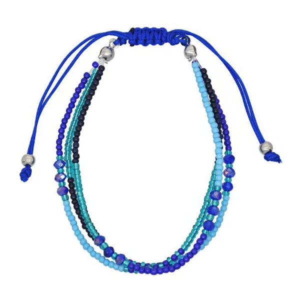Multistrand beaded bracelet with blue, black, and turquoise beads on a white background