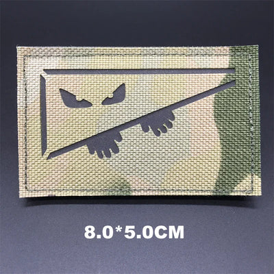 Rectangular patch with a design on a dark background