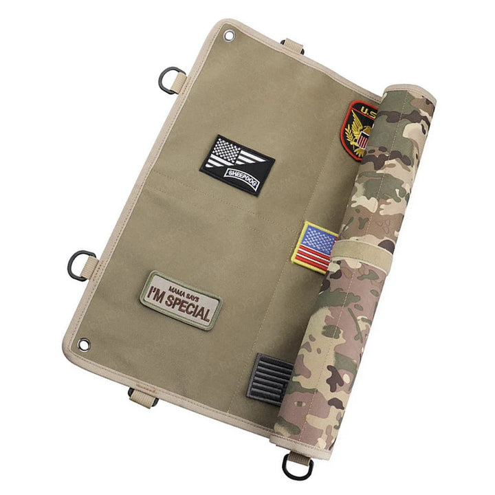 Tactical display board half rolled showing some patches attached on a white background