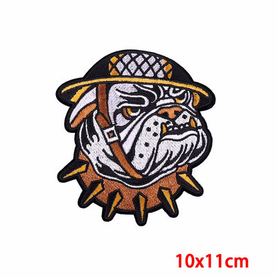 Embroidered patch of a bulldog wearing a hat on a white background