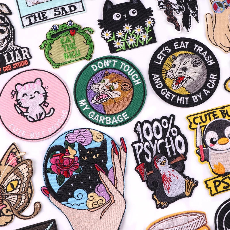 Collection of various colorful patches with different designs on a white background