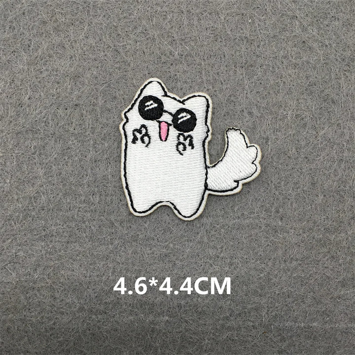 White ghost patch with black sunglasses and pink tongue on a gray background, size 4.6*4.4CM.