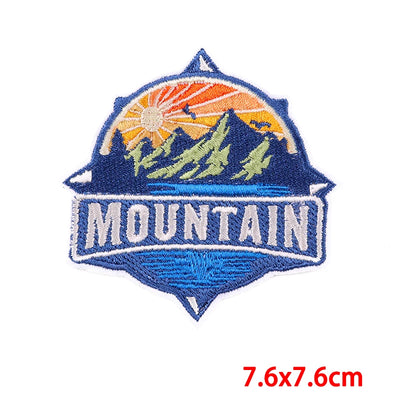 Mountain-themed patch with scenic design and 'MOUNTAIN' text on a white background