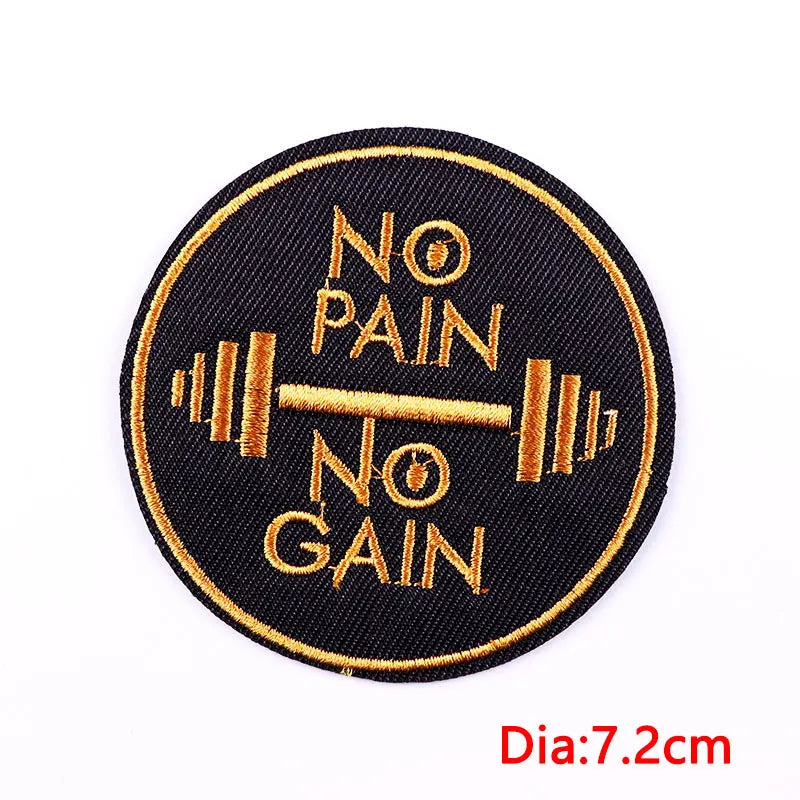 Round patch with 'No Pain No Gain' text and barbell illustration on a black background