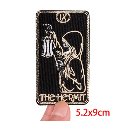 Tarot card patch of 'The Hermit' with dimensions 5.2x9cm on a white background