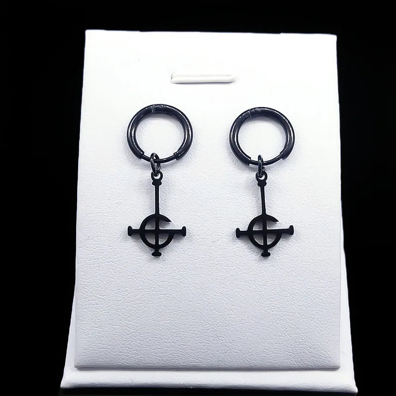 Black earrings on a white earring card with a black background