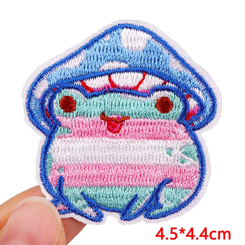 Embroidered patch of a cartoon crab with a white background