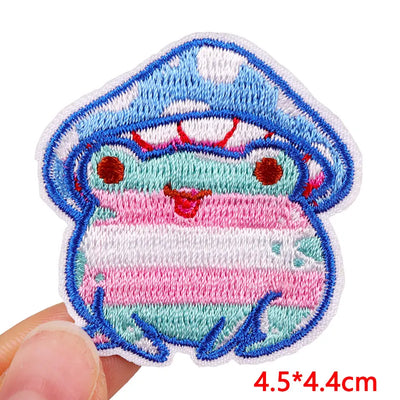 Embroidered patch of a cartoon crab with a white background
