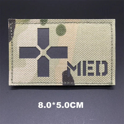 Tactical patch with medical cross symbol and 'MED' text on a dark background
