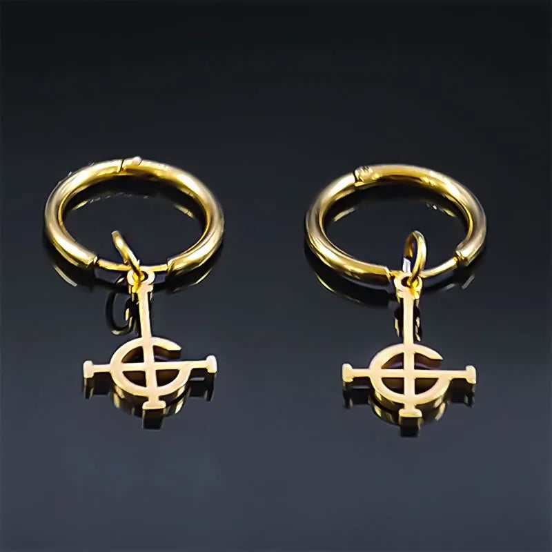 Gold hoop earrings with a symbol pendant on a black background