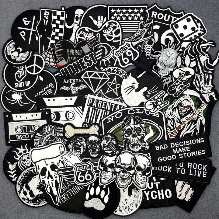 Collection of various black and white stickers on a gray background
