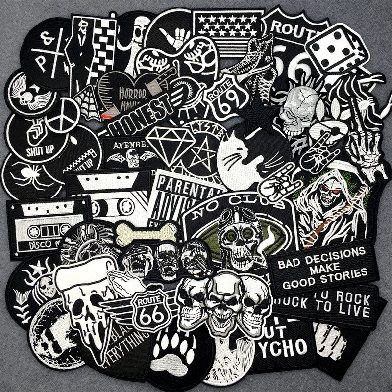 Collection of various black and white stickers on a gray background