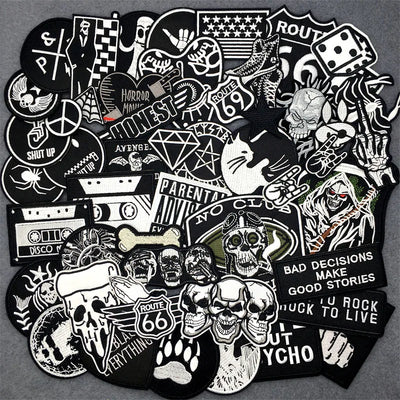 Collection of various black and white stickers on a gray background
