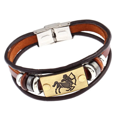 Multistrand leather bracelet with metal beads and Sagittarius sign charm on a white background