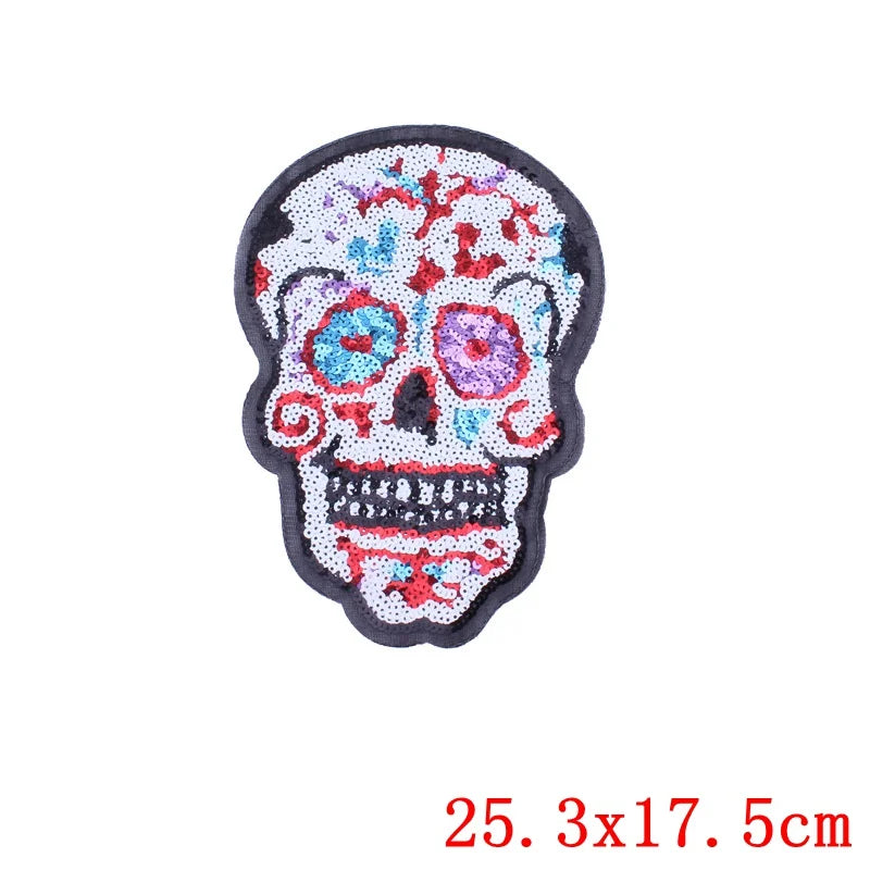 Colorful skull patch with sequins on a white background
