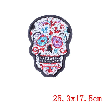 Colorful skull patch with sequins on a white background