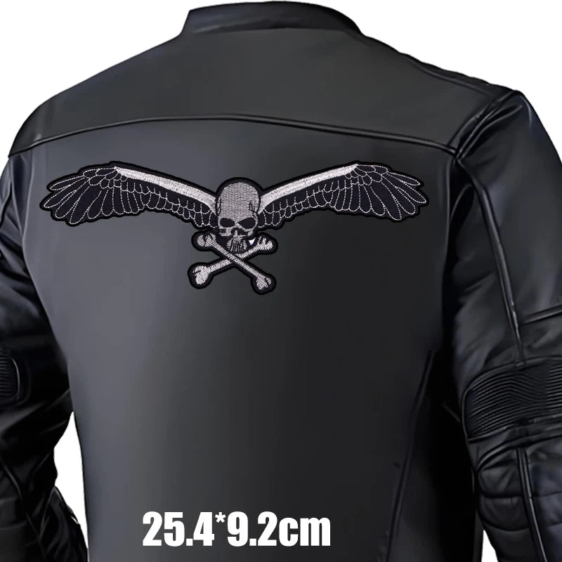 Black leather jacket with skull and wings emblem on a white background